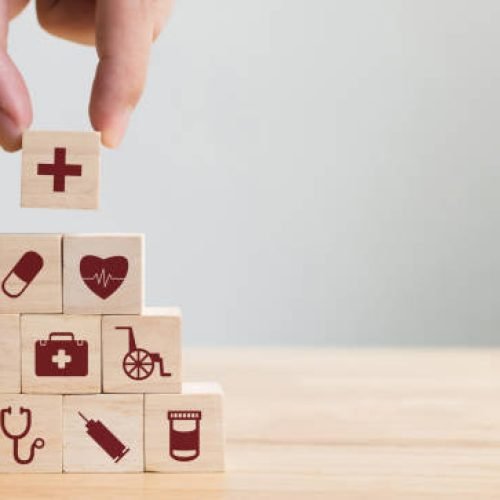istockphoto-917079152-612×612 Hand arranging wood block stacking with icon healthcare medical, Insurance for your health concept